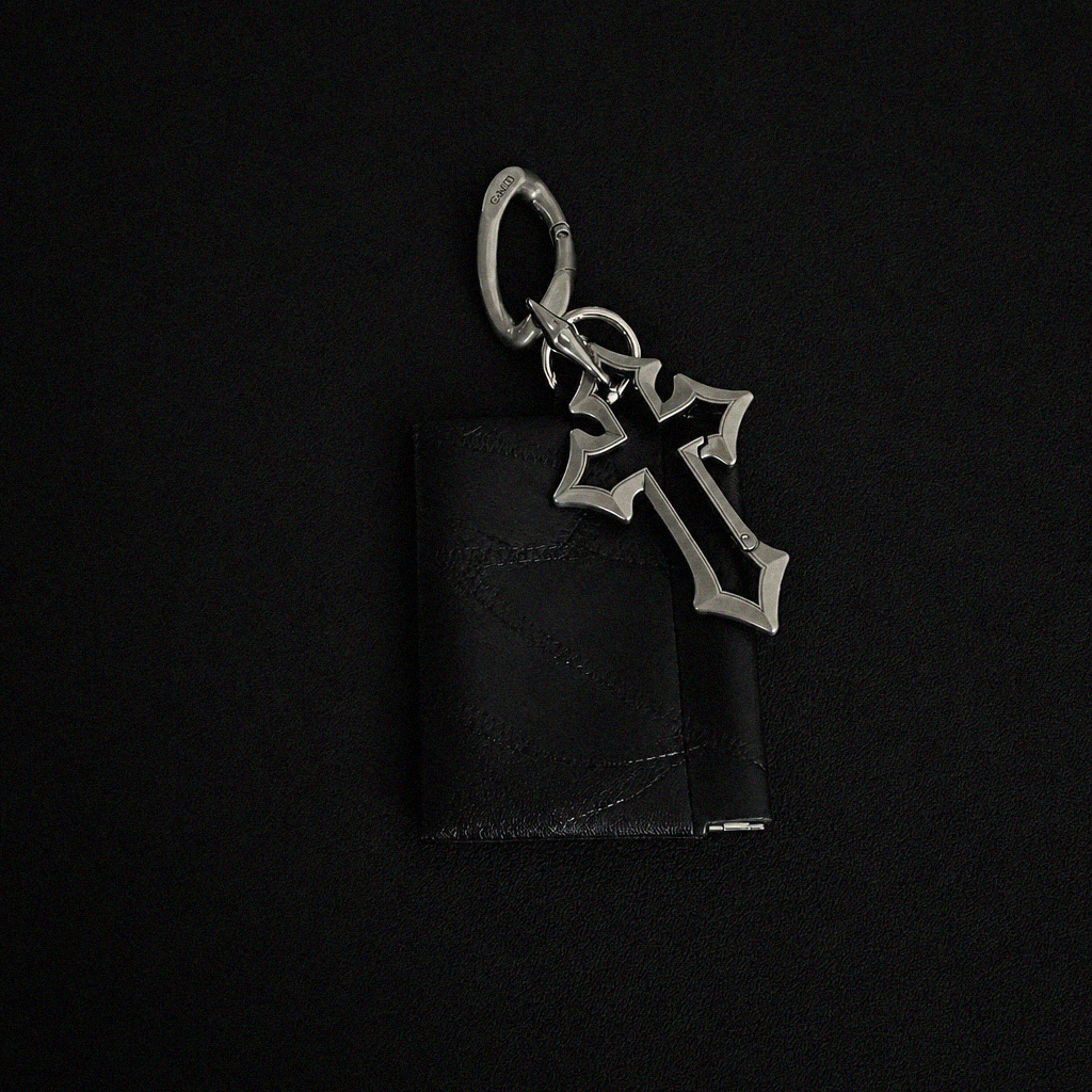HOLLOW CROSS POUCH PENDANT